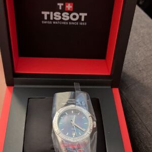 Tissot Silver Watch with Blue Dial